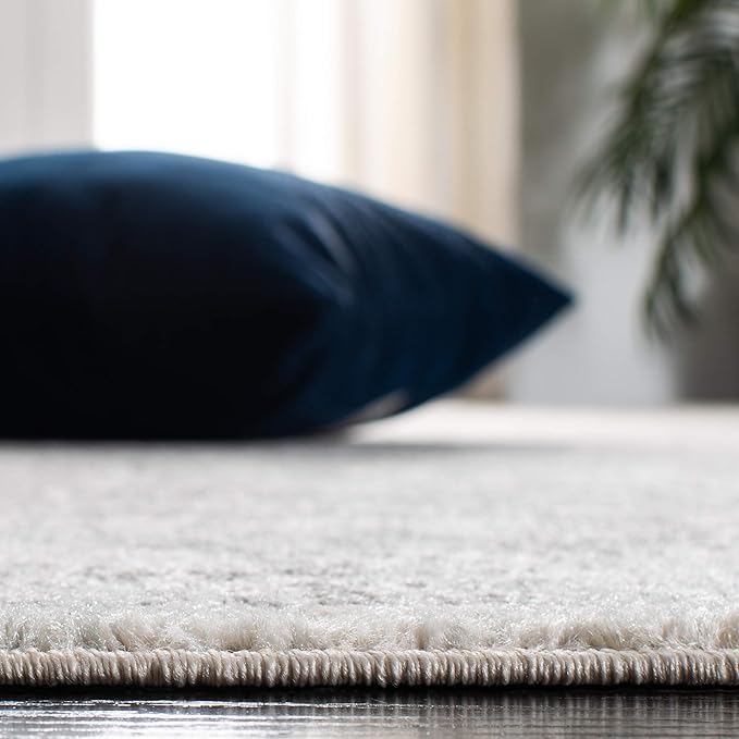 SAFAVIEH Evoke Collection Area Rug - 5'3" Round, Ivory & Grey, Distressed Design, Non-Shedding & Easy to Clean, Ideal for Living Room, Bedroom, Dining Space (EVK256F)