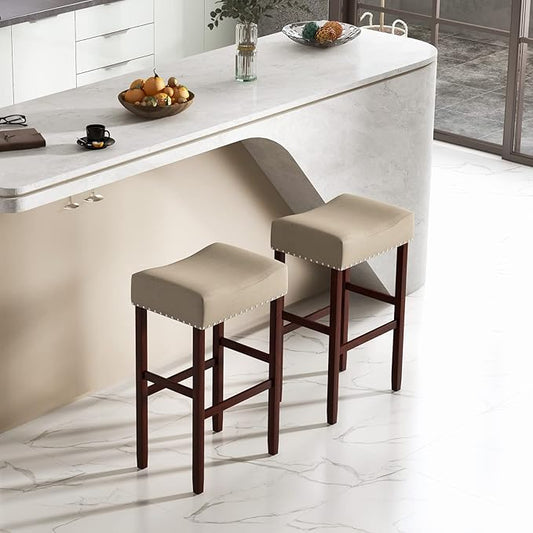 COSTWAY Counter Height Bar Stools Set of 2, 29.5-inch Backless Saddle Stools with Nailhead Trim, Footrest, Max Load 330 Lbs, Upholstered Barstools for Kitchen Island Pub, Beige