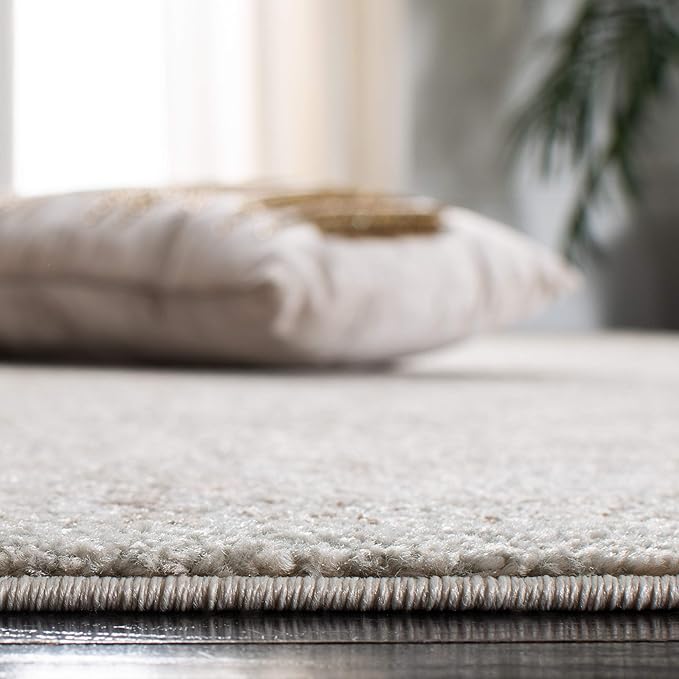 SAFAVIEH Evoke Collection Area Rug - 3' Round, Ivory & Taupe, Distressed Design, Non-Shedding & Easy to Clean, Ideal for Foyer, Bedroom, Accent Space (EVK256E)