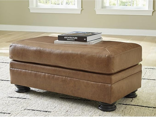 Signature Design by Ashley Carianna Traditional Firmly Cushioned Leather Rectangular Ottoman with Decorative Turn Legs, Brown