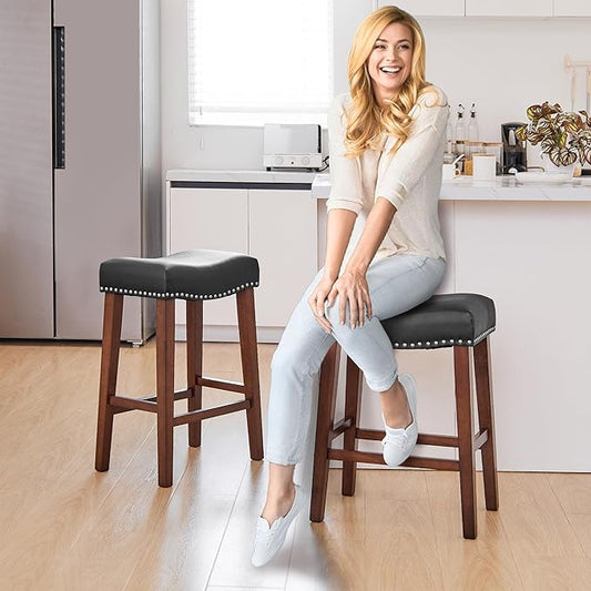 PrimeZone Counter Height Bar Stools Set of 8 - Backless Saddle Barstools with 4.3" Thick Upholstered, Nailhead Trim Faux Leather & Solid Wood Legs, 26 Inch Counter Stools for Kitchen Island, Black