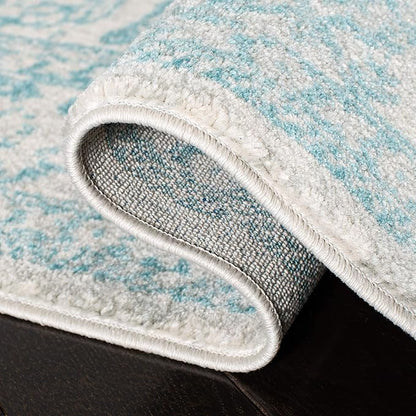 SAFAVIEH Evoke Collection 4' x 6' Ivory / Aqua EVK256J Oriental Distressed Non-Shedding Living Room Bedroom Accent Rug