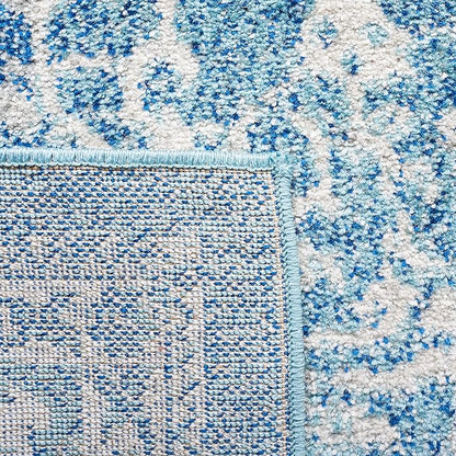 SAFAVIEH Area Rug 10x14 - Evoke Collection - Large - Blue & Ivory, Distressed Design, Non-Shedding & Easy to Clean, Ideal for Living Room, Bedroom, Dining Space (EVK256C)