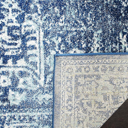 SAFAVIEH Evoke Collection Accent Rug - 2'2" x 5', Navy & Ivory, Distressed Design, Non-Shedding & Easy to Clean, Ideal for Front Door, Kitchen, Entryway, Accent Space (EVK256A)
